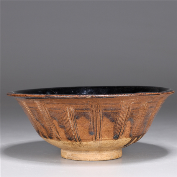 Appraisal: Chinese Tang Dynasty bowl the interior with mirror black glazed