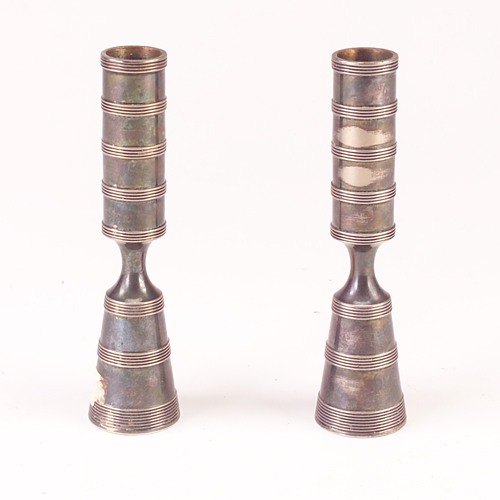 Appraisal: Pair of early Dansk chrome candleholders Worn Stamped mark