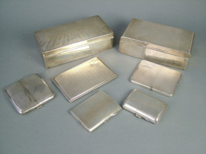 Appraisal: Two silver cigarette boxes one by Mappin Webb Birmingham the