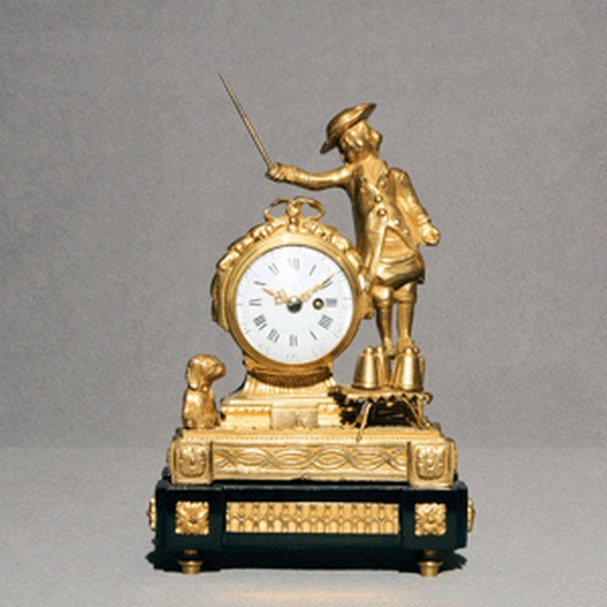 Appraisal: CLOCK Gilt bronze clock in the form of a magician