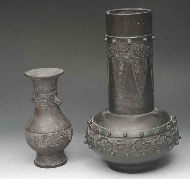 Appraisal: A CHINESE BRONZE VASE with stylistic decoration high and an