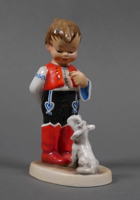 Appraisal: International Hummel Hungarian boy with dog This piece is very