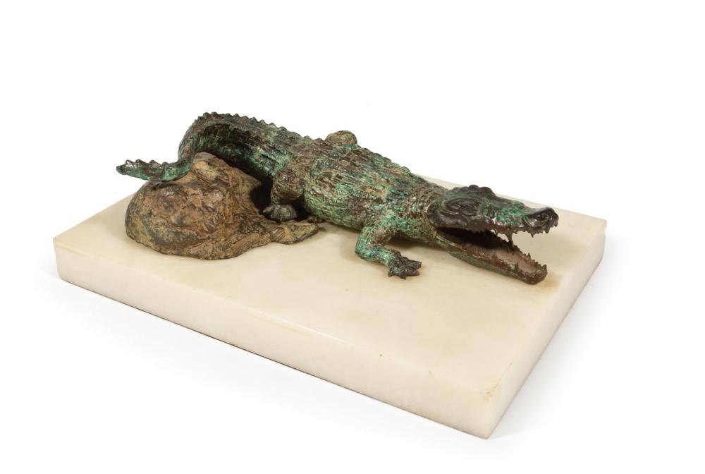 Appraisal: Bronze Figure of an Alligator descending a rock formation marble