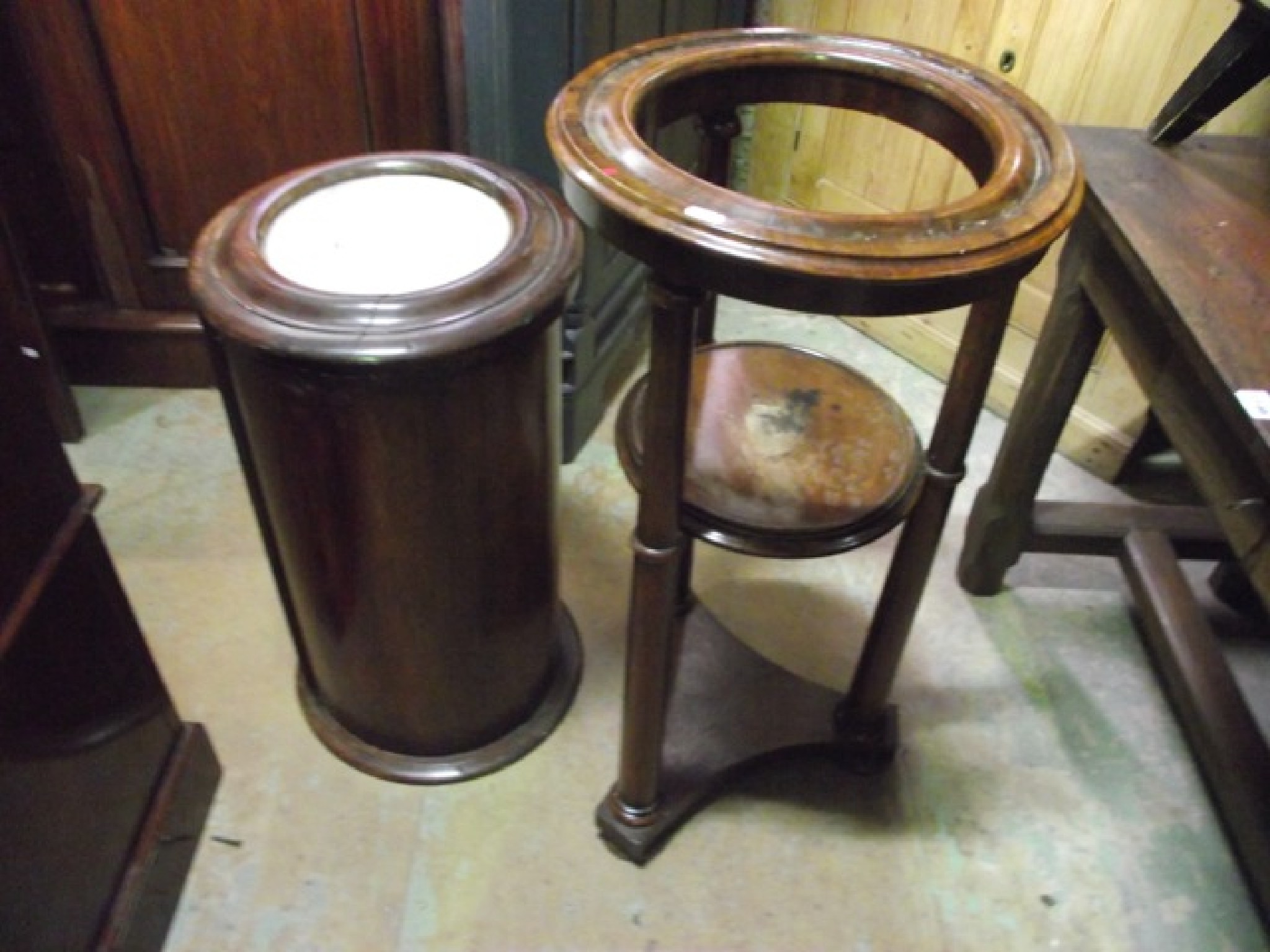 Appraisal: A Victorian mahogany pot cupboard of cylindrical form with inset