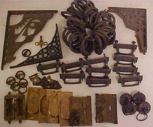 Appraisal: Late th C metal hardware drawer pulls shelf brackets escutcheons