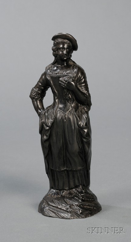 Appraisal: Black Basalt Figure of a Maiden England early th century