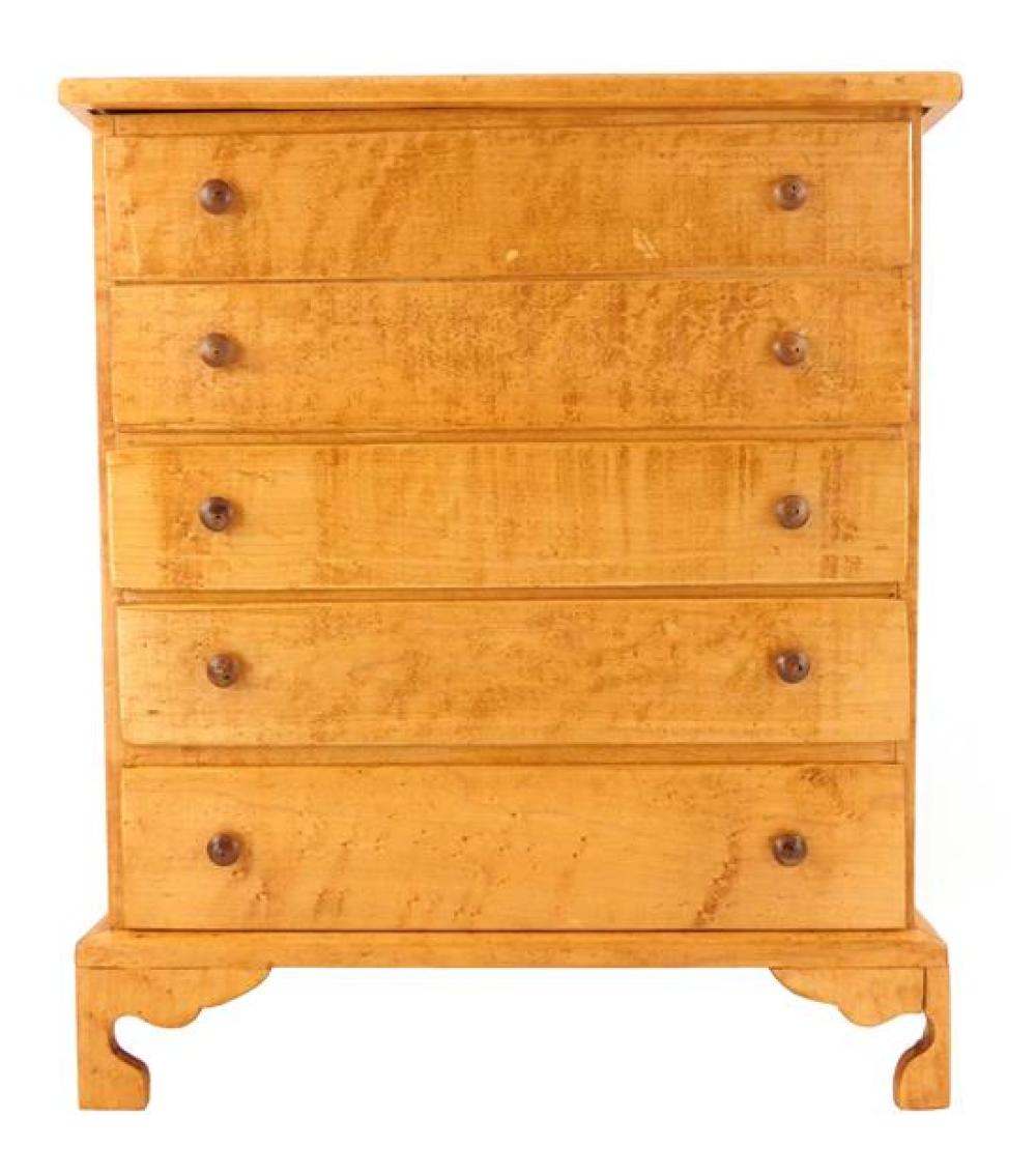 Appraisal: Miniature chest figured maple lift top over three working drawers