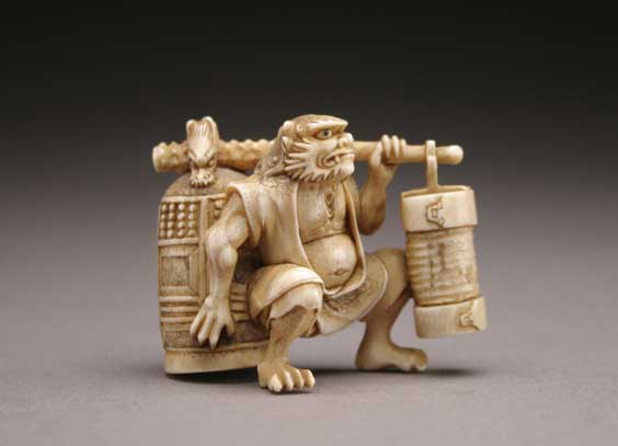 Appraisal: CARVED IVORY NETSUKE Well carved ivory netsuke of an oni