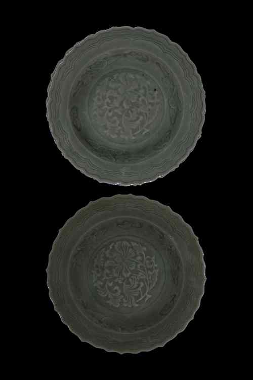 Appraisal: Two Chinese porcelain celadon glazed bowls incised with phoenix and