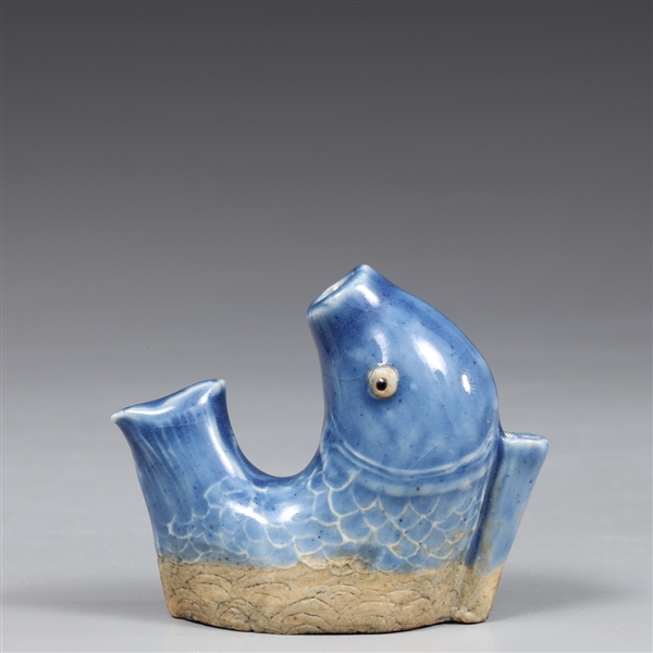 Appraisal: Chinese blue glazed fish figural water dropper fish breaching water