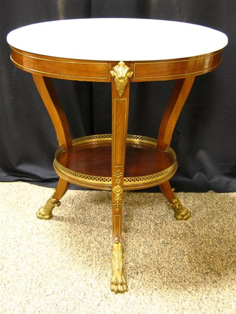 Appraisal: DIRECTOIRE MAHOGANY CIRCULAR GUERIDON Early th century with cirucalr white