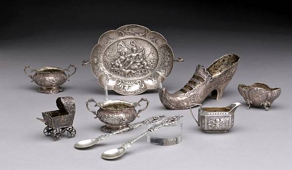 Appraisal: A group of continental silver novelties table articles and flatware