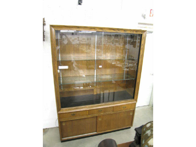 Appraisal: Display Cabinet double glass doors above three drawers double doors