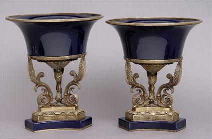 Appraisal: PAIR OF LOUIS XVI-STYLE GILT-METAL MOUNTED COBALT-GLAZED POTTERY JARDINIERES Each