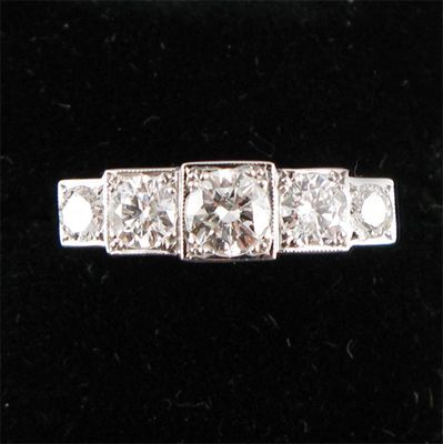 Appraisal: A diamond five stone ring The five graduated circular cut