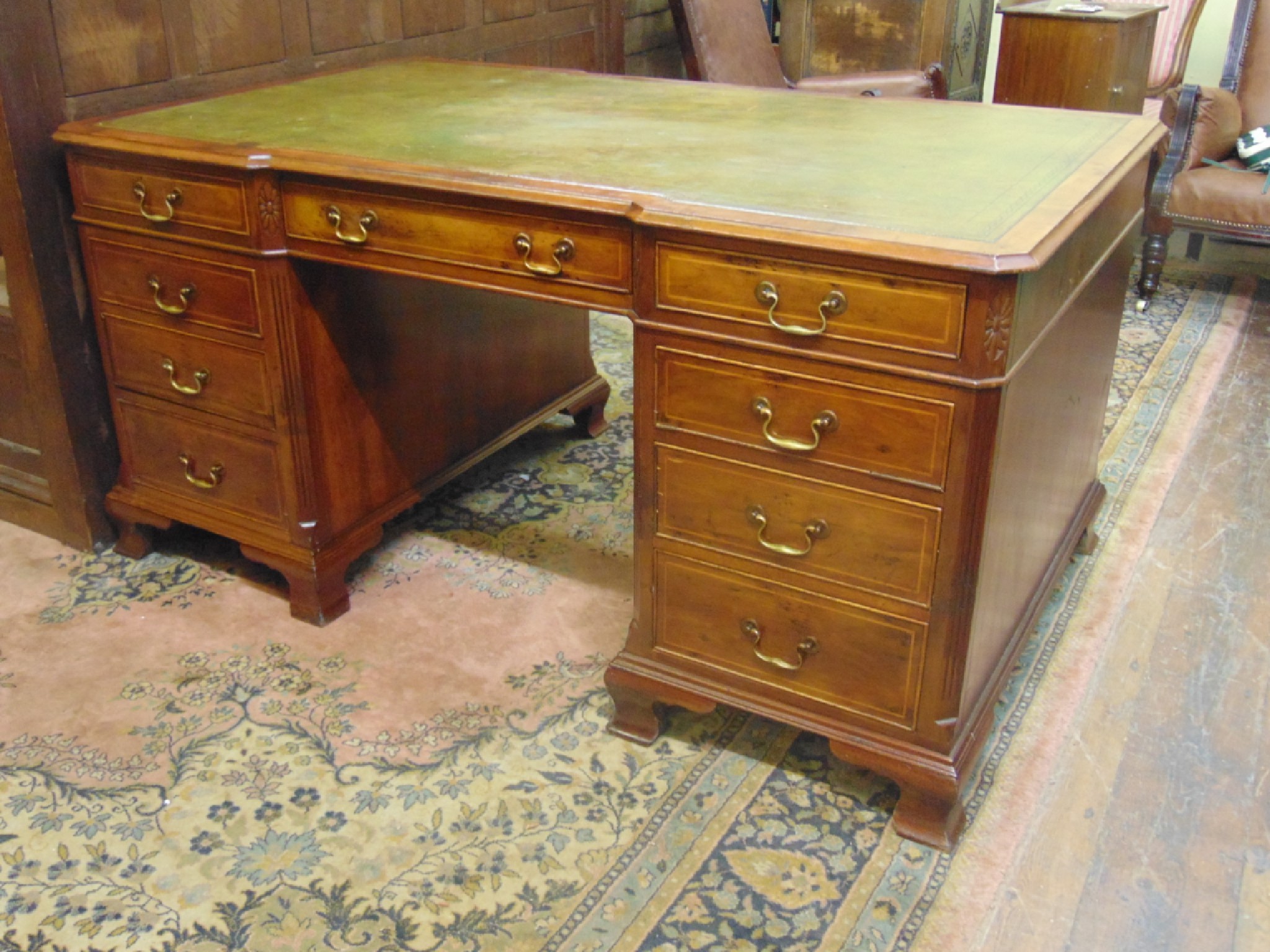 Appraisal: A Georgian style inverted breakfront partners writing desk fitted with