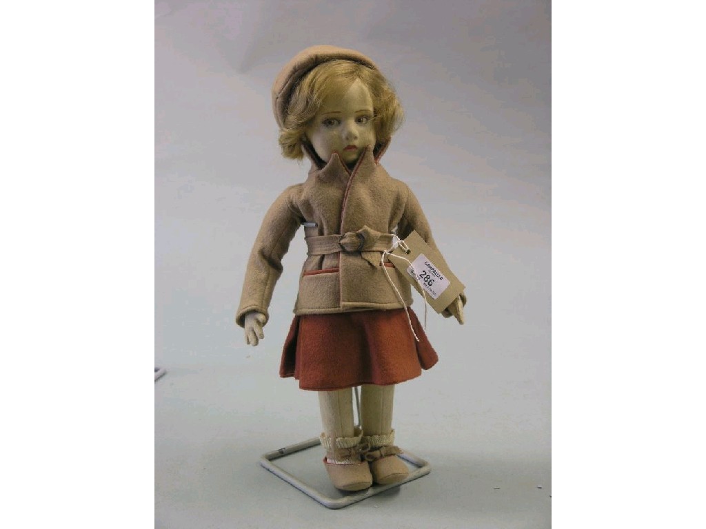 Appraisal: A Lenci cloth doll girl with painted facial features clothed