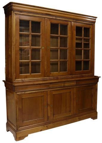 Appraisal: French Louis Philippe style fruitwood stepback bookcase th c ogee