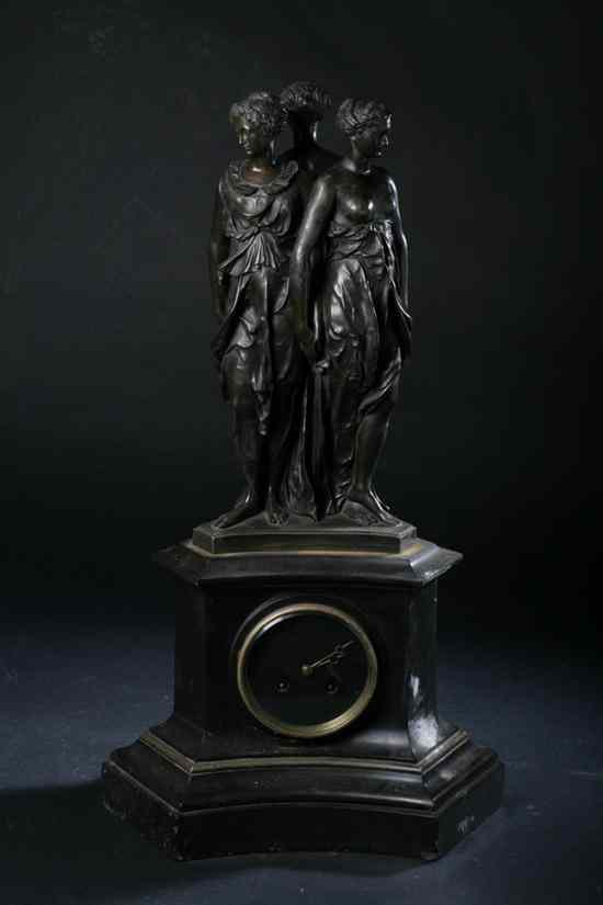 Appraisal: CONTINENTAL BRONZE AND BLACK MARBLE FIGURAL MANTLE CLOCK THE THREE