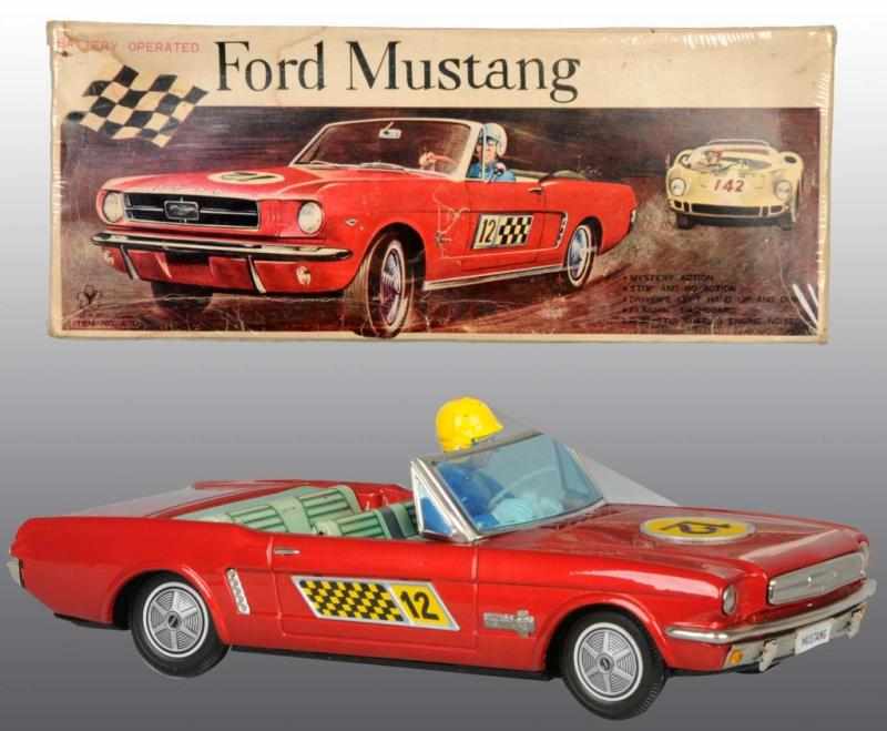 Appraisal: Tin Mustang GT Car Friction Toy Description Japanese Circa Working