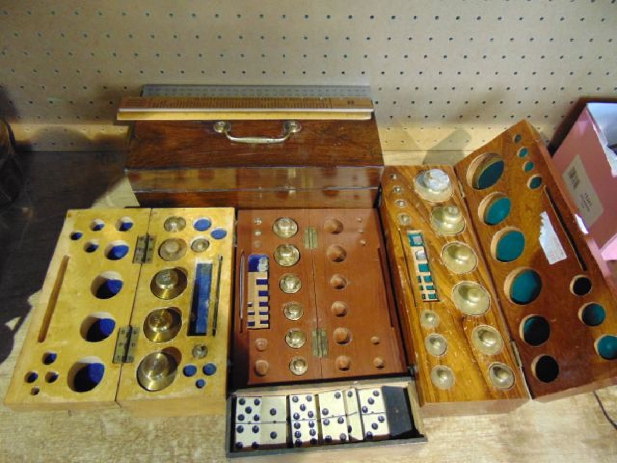 Appraisal: A vintage timber cased set of brass cylindrical precision weights