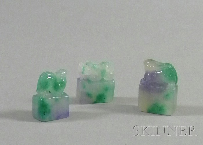 Appraisal: Three Asian Green Stone Seals green white and purple stone