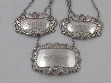 Appraisal: Three hallmarked silver wine labels