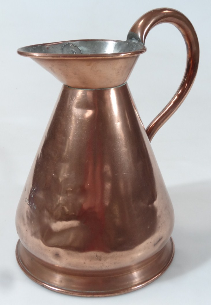 Appraisal: An early thC copper harvest jug of tapering cylindrical form