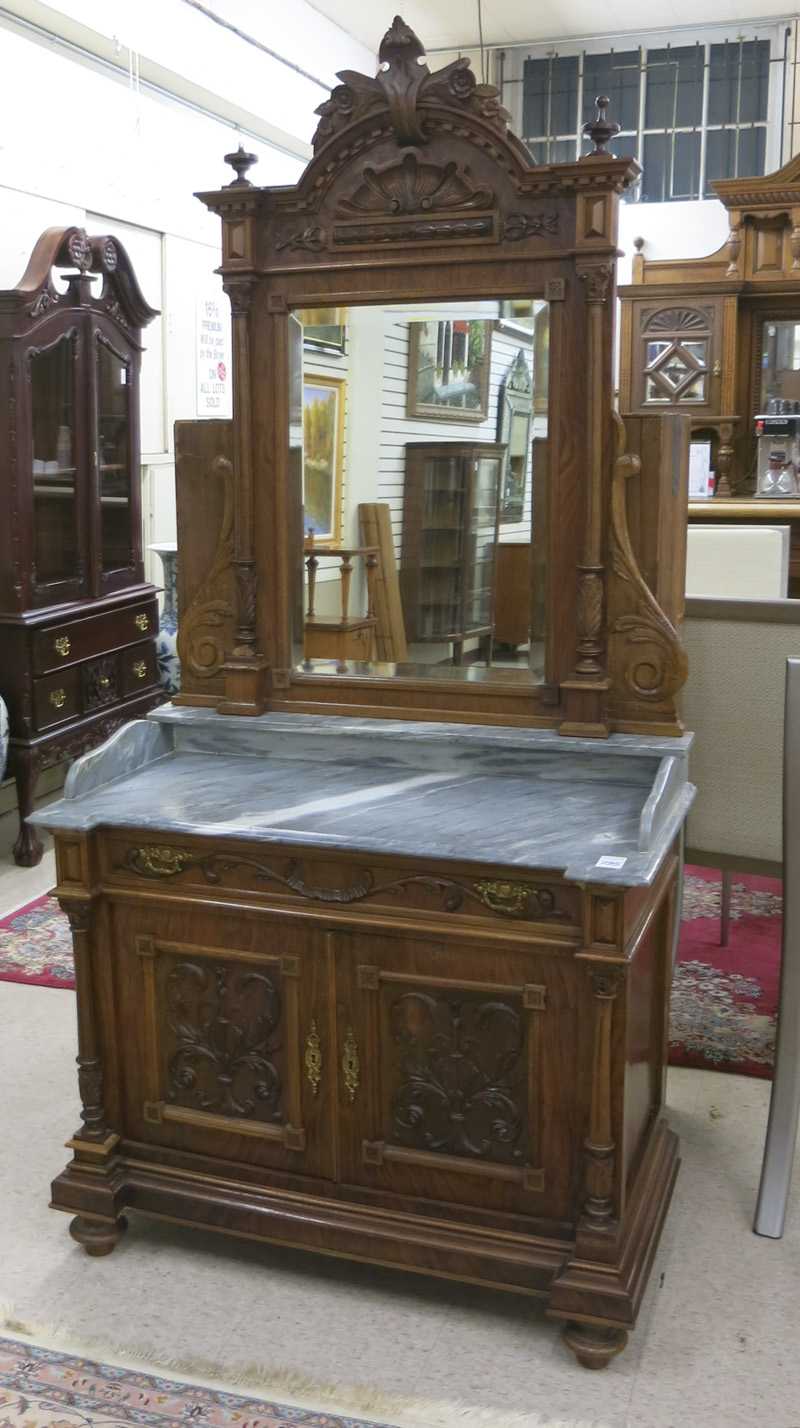 Appraisal: MARBLE-TOP WALNUT WASHSTAND Austrian th century a -door cabinet washstand