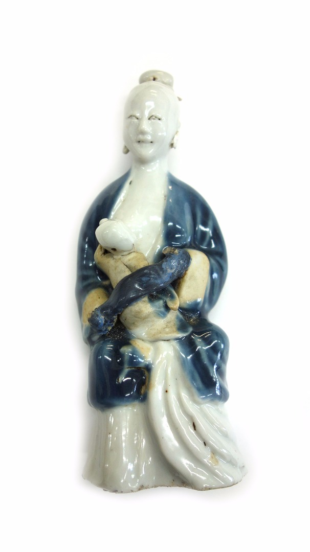 Appraisal: A Chinese blanc de chine porcelain figure Qianlong of a