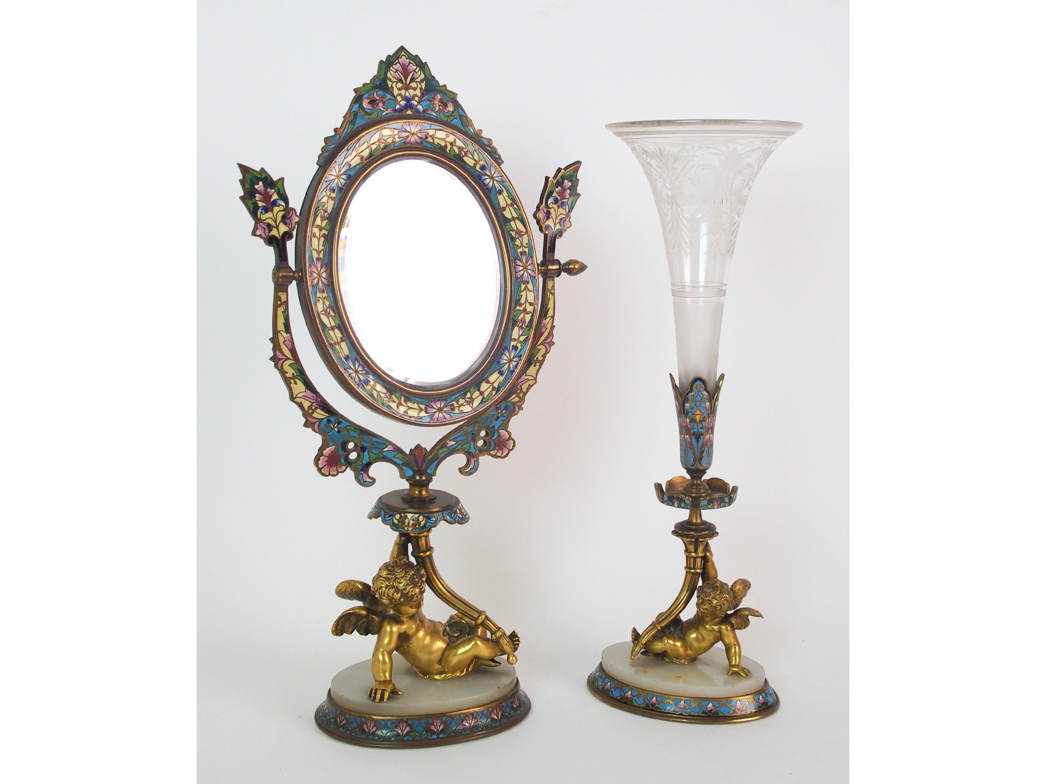 Appraisal: A French gilt bronze and champleve enamel dressing table mirror