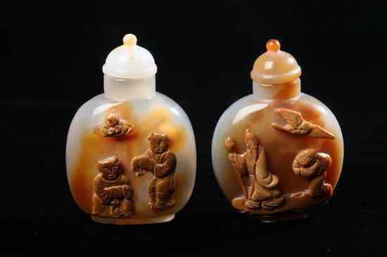 Appraisal: TWO CHINESE CAMEO AGATE SNUFF BOTTLES Flattened ovoid-form carved with