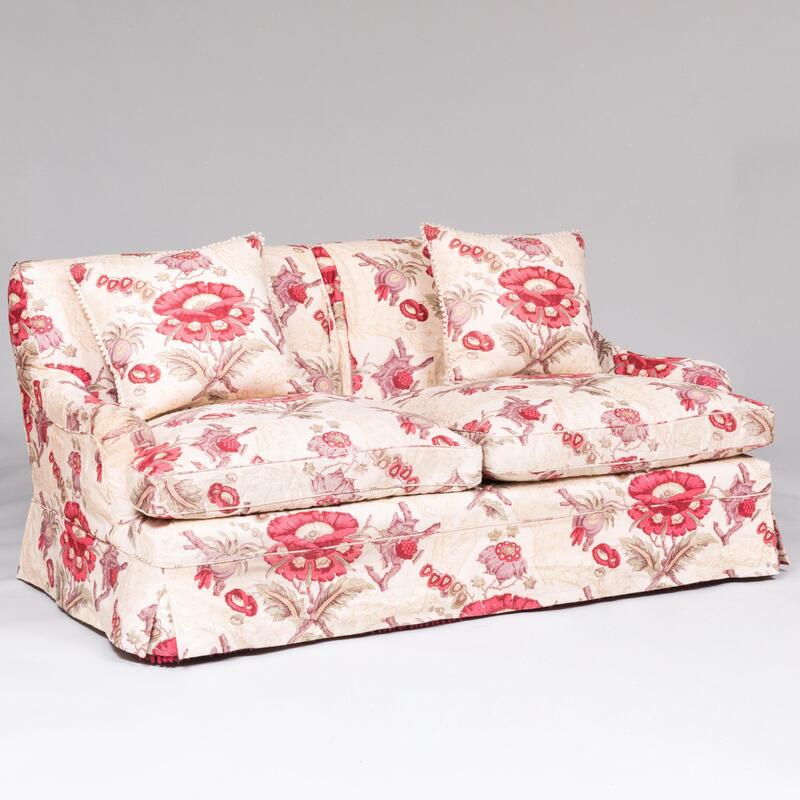 Appraisal: Pair of Printed Floral Linen Two Seat Sofas with Fringe