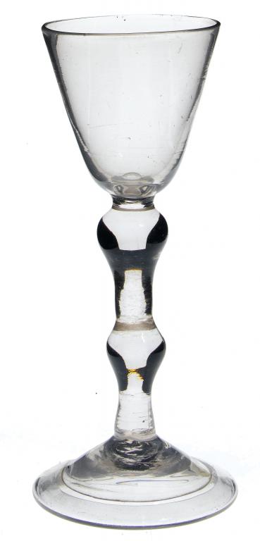 Appraisal: A WINE GLASS the rounded funnel bowl on solid stem