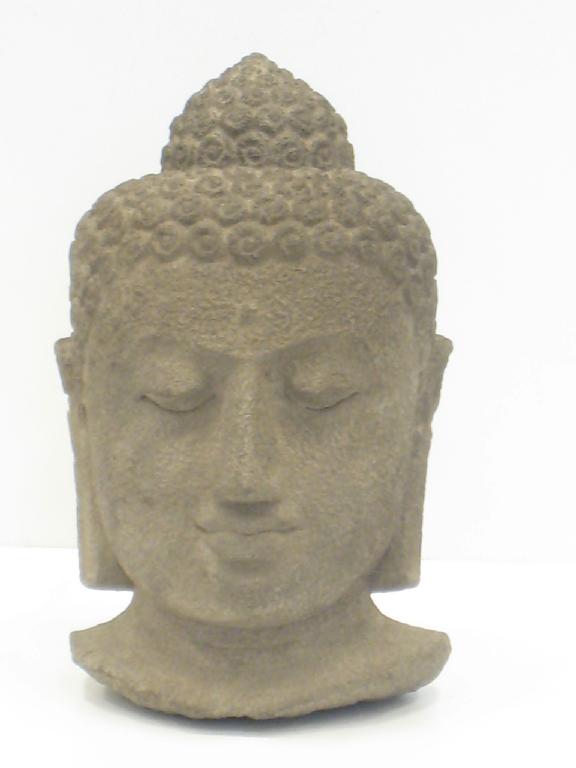 Appraisal: An Indonesian volcanic Buddah Head in meditation pose having elongated