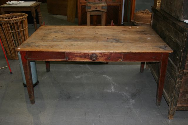 Appraisal: An Australian scrubbed pine topped kitchen table with painted red