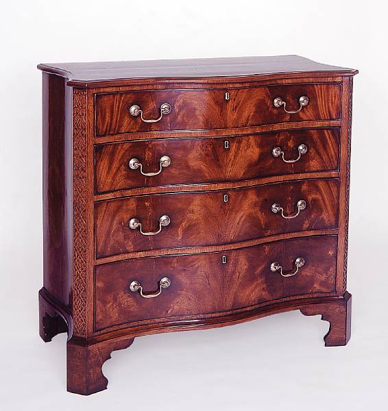 Appraisal: A George III style mahogany chest of drawers Of serpentine