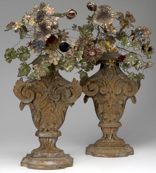 Appraisal: ITALIAN ROCOCO Decorative carved wooden urns with polychrome tin flowers