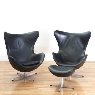 Appraisal: Pair black leather Egg chairs after Arne Jacobsen Pair black