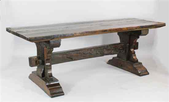 Appraisal: A th century style oak refectory table with trestle underframe