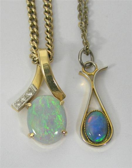 Appraisal: An opal pendant claw set with an oval cut opal