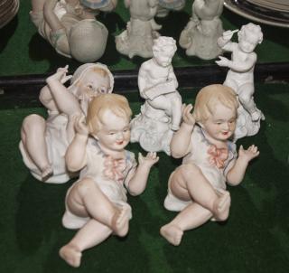 Appraisal: Bisque Pcs Painted Piano Babies Music Babies