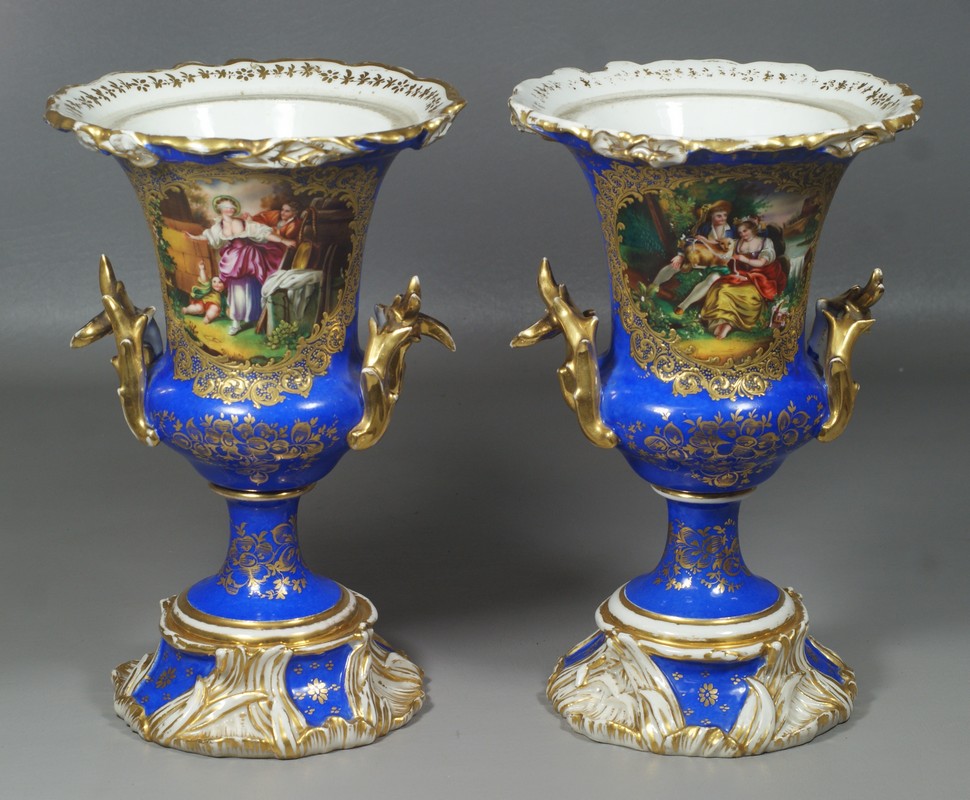 Appraisal: Pair of Continental Urns probably Paris Porcelain decorated in Cobalt