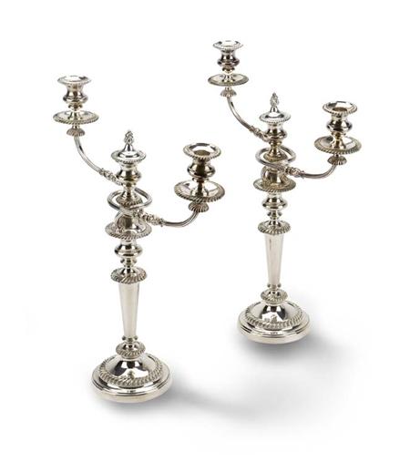 Appraisal: A pair of Sheffield plate three-light candelabra circa with gadroon