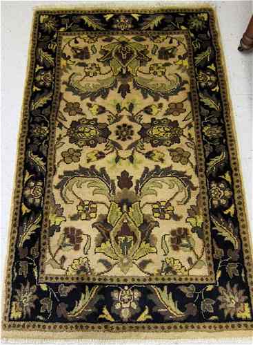 Appraisal: HAND KNOTTED ORIENTAL AREA RUG Indo-Persian overall floral decoration on