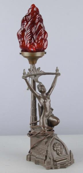 Appraisal: Antique Red Light Torch Lamp This figural lady lamp marked