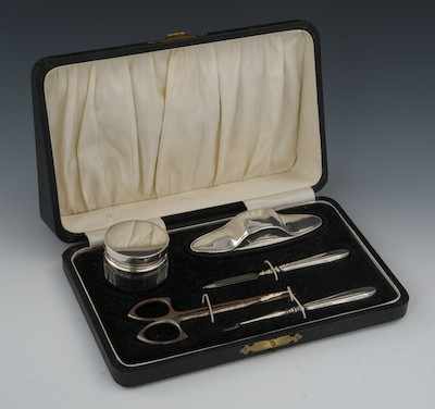 Appraisal: A Boxed Set of Silver Handled Manicure Implements Contained in