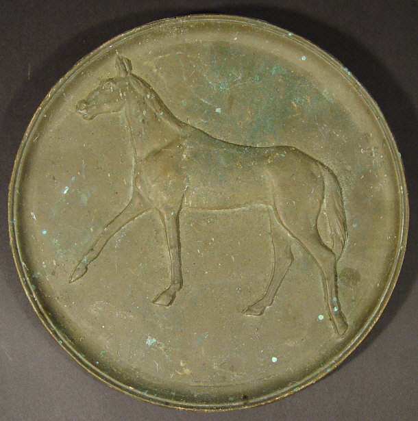 Appraisal: Circular bronze wall plaque cast in relief with a horse