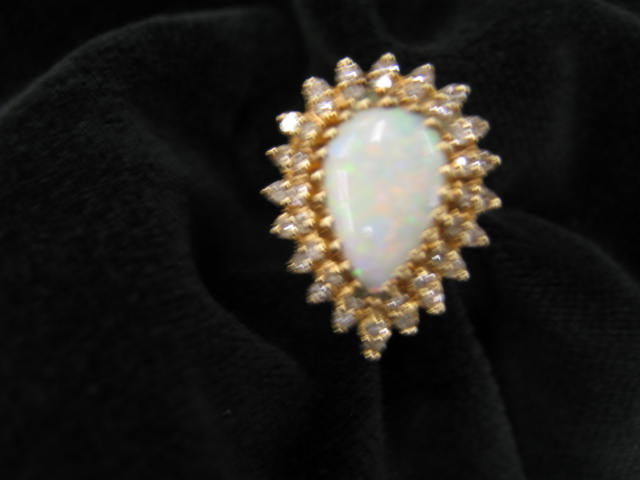 Appraisal: Opal Diamond Ring pear shaped fiery opal surrounded by diamonds