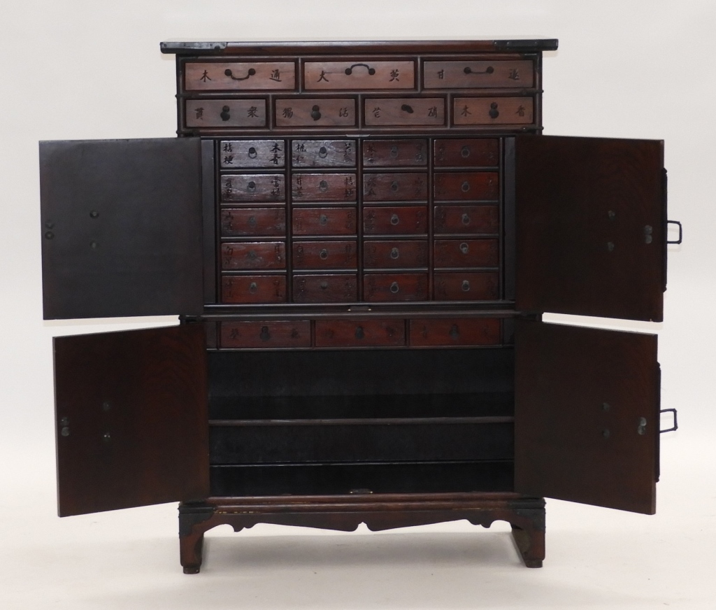 Appraisal: KOREAN ASIAN CARVED HARDWOOD TANSU CABINET Korea th CenturySeven small